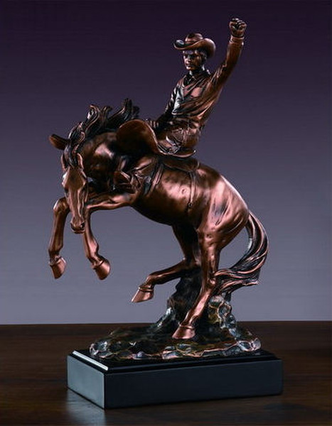 Cowboy breaking horse sculpture recreates the wild old West Figurine